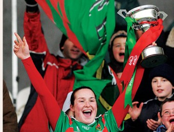 Carnacon captain Michelle McGing lifts the cup. VHI Healthcare All-Ireland Ladies’ Senior Club Football Championship Final. Photo: Sportsfile.