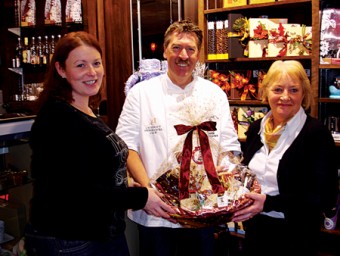 Dirk Schonkeren of Helena Chocolates presenting a Luxury hamper of handmade chocolates to Angela Kirrane of Mayo Cancer Support & Siobhan Jennings of The Beaten Path for their Posh and Spice Charity Fashion and Food extravaganza to be held in the Beaten Path on November 29.