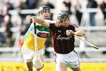 Daniel Currams of Offaly and Damien Joyce of Galway in action from the NHL clash at Pearse Stadium on Saturday. Photo:- Mike Shaughnessy
