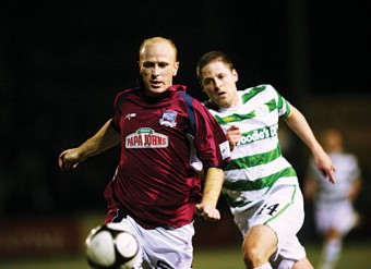 Galway United’s Thomas Heary beats Graham Barrett of Shamrock Rovers to the ball in action from the Airtricity League game in Terryland Park on Friday night. 					Photo:-Mike Shaughnessy
