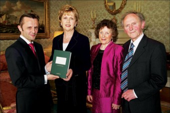  Geoffrey Shannon who hails from Salthill, Galway pictured presenting the book to President McAleese at Áras an Uachtaráin, with his parents Ailish and Eddie Shannon.