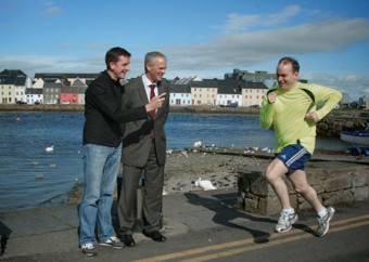 On your marks: Cllr Michael Crowe warms up for the Galway City Bay Half marathon which takes place on Saturday in aid of Cancer Care West watched by Ciarán Hayes, director of services, Galway City Council and race director, Ray O'Connor.  Photo:-Mike Shaughnessy
