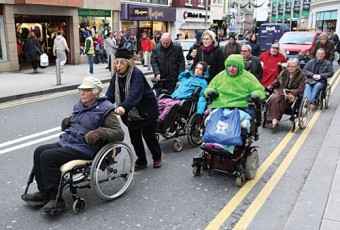 John Arden and Margaretta D'Arcy pictured leading the recent Speakout to highlight the difficulties for wheelchair users in Galway city. Photo: Mike Shaughnessy.