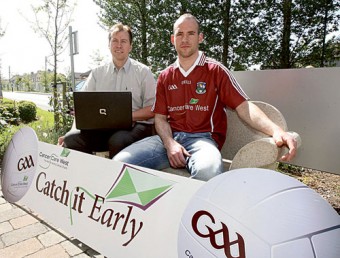 County football star Damien Burke pictured with Richard Flaherty, CEO of Cancer Care West at the launch of Catch It Early.