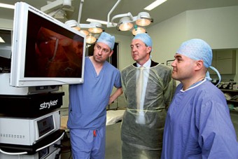 (From left to right) Chris Collins PhD FRCSI, John Donovan, sales manager at MED Surgical, and Eddie Myers MD FRCSI demonstrating the state-of-the-art equipment which has been installed by MED.Surgical, a SISK Group company, in the operating theatres in Portiuncula Hospital in Ballinasloe.
