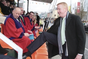 Dep Derek Nolan stepping into the viewing platform for the St Patrick&#039;s Day Parade in 2011.