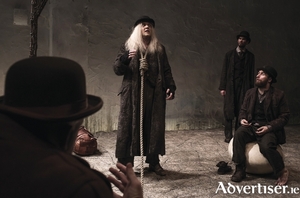 Rory Nolan as Pozzo, Garrett Lombard as Lucky, Mary Rea as Vladimir, and Aaron Monaghan as Estragon in Druid&rsquo;s production of Samuel Beckett&#039;s Waiting for Godot. Photo:- Matthew Thompson