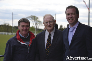 Padraic Carney with Kieran Peyton (Swinford GAA club )and Michael Murtagh (Swinford GAA) chairman, at the re-dedication of Swinford GAA pitch after Garda Robert McCallion in 2012. Photo: Michael Maye
