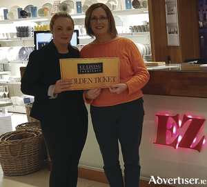 Melissa Casserly from EZ Living Terryland presents Noirin Ui Ghoill with her prize.