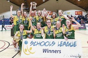 Top of the class: The Gortnor Abbey girls celebrate winning the league title in the National Basketball Arena in Dublin. Photo: Rockmountain Studios