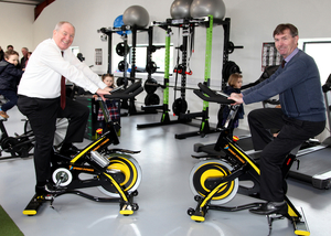 On their bikes: At the official opening of Tourmakeady GAA Club&#039;s new facilities were Minister Michael Ring and Cllr Al McDonnell. Photo: Trish Forde.