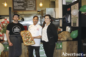 From left: Callan Qualter from Handsome Burger, Matteo Magnetti from Pizza M, who is just back from the Pizza World Championships in Parma, and Louise Kelly from Joyce&#039;s Athenry, pictured at the pizza burger party held recently in Joyce&#039;s Supermarket, Athenry, to celebrate its new food court.