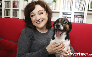 Irish soprano Ailish Tynan with canine friend.