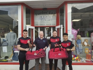 Dressed to impress: Ballyhaunis Town are presented with gear bags by Tom Forde from Forde&#039;s Ltd for the new season. Left to right: James Cribbin, Tom Forde, Richie Crinnigan and Hamood Althobhaney