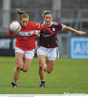 Aishling Hutchings of Cork is chased down by Sinead Burke of Galway during the Lidl Ladies National Football League division one final at Parnell Park in Dublin. 	Photo by Brendan Moran/Sportsfile 