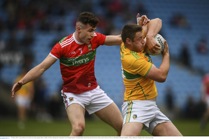 Man and ball: Mayo&#039;s Barry Duffy tackles Conor Beirne from Leitrim in the Connacht Junior Football Championship semi-final. Photo: Sportsfile. 