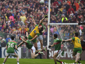 Up in the air: Lee Keegan and Colm Boyle engage in some aerial acrobatics with Michael Murphy last Saturday. Photo: Sportsfile