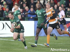 Over he goes: Kieran Marmion about to score Connacht&rsquo;s second try watched by Niyi Adeolokun and Ruan Pienaar of Toyota Cheetahs  in action from the Guinness PRO14 game at the Sportsground on Saturday. Photo: Mike Shaughnessy