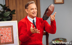 Tom Hanks as Fred Rodgers.