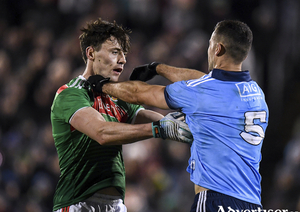 Getting to know you: Diarmuid O&#039;Connor and James McCarthy get to grips with each other last Saturday night. Photo: Sportsfile 
