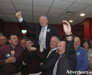 Up and in: Michael Ring celebrates after being elected. Photo: Michael Donnelly 