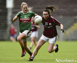 Galway&#039;s Nicola Ward , in action against Fiona Doherty of Mayo, is getting back to full fitness while beginning her first job as a nurse in Crumlin. 