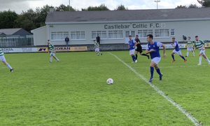 On the break: Enda McGahon looks to get Manulla moving against Castlebar Celtic 