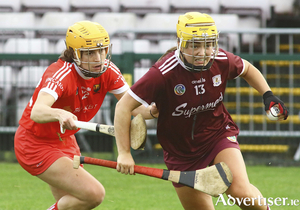 Galway forward Siobhan McGrath is chased by Cork&#039;s Ellen Murphy in action from the 2020 Liberty insurance Senior Camogie Championship round three game at Pearse Stadium on Sunday. 
Photo:-Mike Shaughnessy