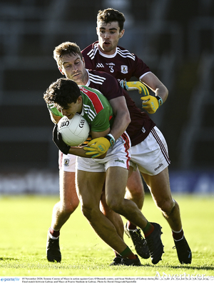 Trying to get to grips with Mayo&#039;s Tommy Conroy are Galway&#039;s Gary O&#039;Donnell, centre, and Sean Mulkerry during the Connacht Senior Football Championship final at Pearse Stadium in Galway.                 Photo:  David Fitzgerald/Sportsfile