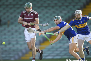 Brian Concannon of Galway in action against Cathal Barrett and Brendan Maher of Tipperary in the All-Ireland Senior Hurling Championship quarter-final against  Tipperary at LIT Gaelic Grounds in Limerick. Photo by Piaras  Mcdheach/Sportsfile