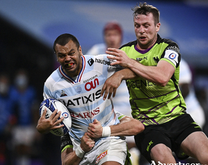 Kurtley Beale of Racing 92 is tackled by Jack Carty and John Porch of Connacht during the Heineken Champions Cup Pool B Round 1 match at La Defense Arena in Paris, France. Photo by Harry Murphy/Sportsfile