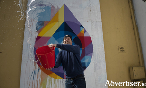 Changing States, a new Athenry Street Mural by artist Shane O&#039;Malley (pictured) that changes colour depending on the weather. Photo: Andrew Downes xposure