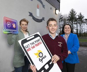 Teacher Anne Mulkeen and Maria Byrne, deputy principal, with student Cian Mangan, St Colman&#039;s College, Claremorris, who will was showcasing his project &#039;Tyrex&#039; at the 58th BT Young Scientist &amp; Technology Exhibition this week. Photo: Fennell Photography 2022. 