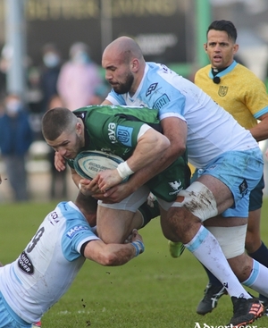 Connacht&#039;s Diarmuid Kilgallen is tackled by Glasgow Warriors George Horne and Kiran McDonald in the URC game against Glasgow at the Sportsground on Saturday. Photo:- Mike Shaughnessy