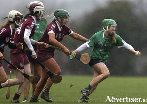 Slaughtneil&#039;s Shannon Graham challenges Laura Ward of winners Sarsfields in the All Ireland Senior Camogie semi-final on Sunday played in atrocious weather at Gorey&#039;s Naomh &Eacute;anna ground.   Photo: &copy;INPHO/Tom Maher