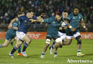 Connacht&rsquo;s Conor Oliver, supported by Bundee Ak on the charge against Leinster in the Heineken Champions Cup round of 16 first leg at the Sportsground.
