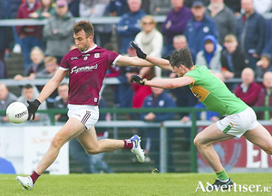 Leitrim&#039;s Pearce Dolan attempts to stop Galway&#039;s Paul Conroy in action in the Connacht GAA Senior Football Championship semi-final at Pearse Stadium on Sunday. 
Photo:- Mike Shaughnessy