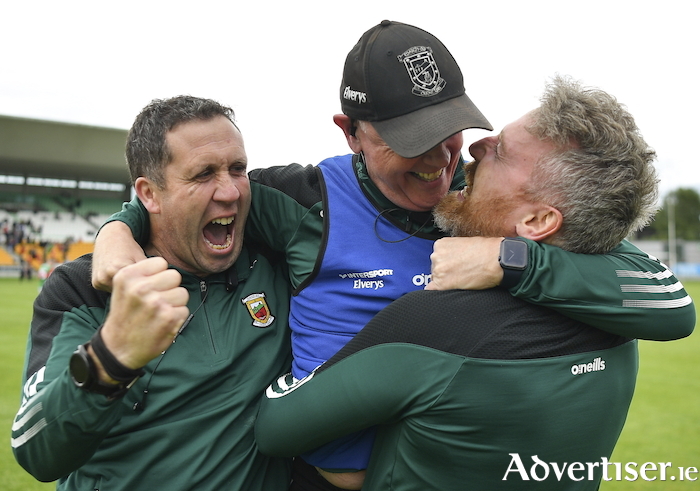 Mayo manager Sean Deane, centre, celebrates with backroom team members Danny O'Toole, left, and Shane Nallen after their win over Kerry. Photo: Sportsfile. 