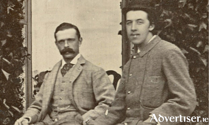 Oscar Wilde (Right), as a young man,  taken from a shooting party outing on the steps of Ashford castle.