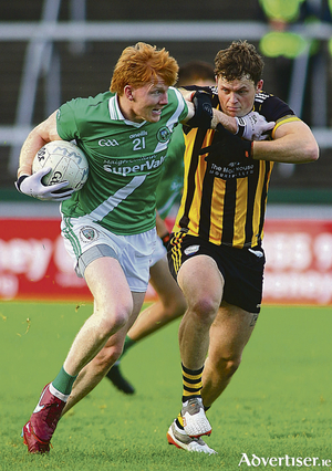 Moycullen&#039;s Peadar &Oacute; Cuaig fends off Michael Daly of Mountbellew Moylough in  the Bons Secours Galway Senior Football Championship semi-final at Pearse Stadium on Sunday. Photo:- Mike Shaughnessy