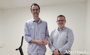 Atlantic Prosthetic Orthotic Solutions with an Innovation Boost award recognising &quot;outstanding innovation.&quot;  Pictured (l-r)  holding the trophy is graduate Jason Benton who is now a full-time employee with the company and  Darren Matthews General Manager of APOS.
