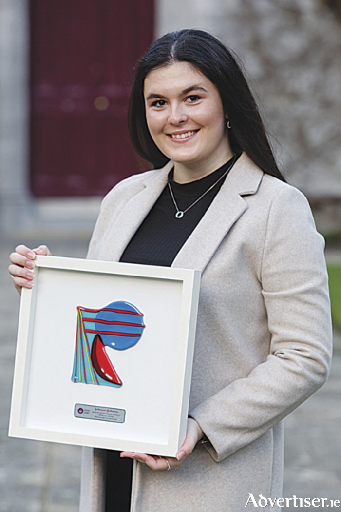 Athlone student, Rebeccca Norris, was presented with a bespoke framed glass artwork to mark their receipt of a scholarship from global healthcare company, Johnson & Johnson, as part of its WiSTEM2D Programme at University of Galway. Photo Martina Regan
