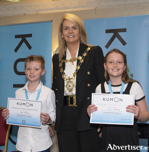 Eoin and Mia Murray, maths bronze medallists, with the Mayor of Galway City Clodagh Higgins at the Kumon Awards Ceremony. 
Photo: Murt Fahy.