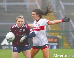 Galway&#039;s Megan Glyn and Cork&#039;s Erika O&#039;Shea in action from the Lidl LGFA League game at Pearse Stadium on Sunday. Photo:- Mike Shaughnessy 