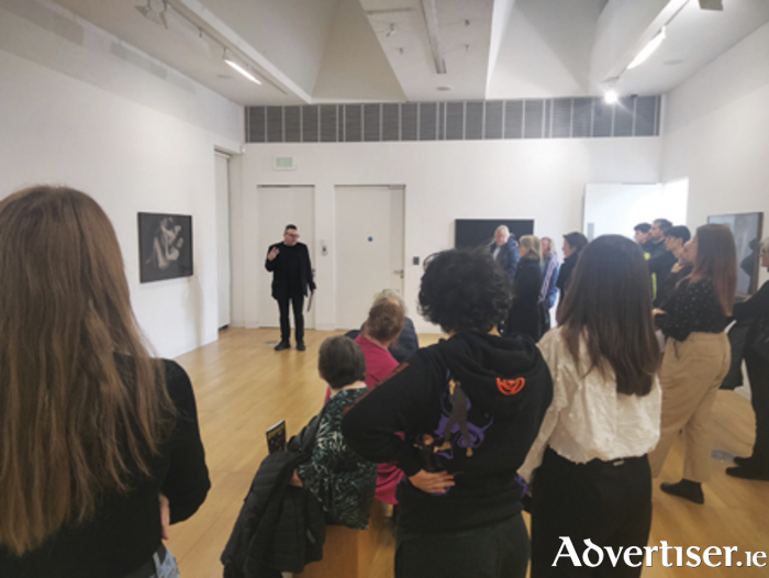 Eamonn Maxwell guest curator addressing the crowd at the publication launch of ‘At the Gates of Silent Memory’ in the Luan Gallery
