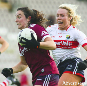 Galway&rsquo;s Leann Coen is chased by Cork&rsquo;s Katie Quirke in the TG4 Championship round one game at Pearse Stadium on Saturday. Photo: Mike Shaughnessy 
