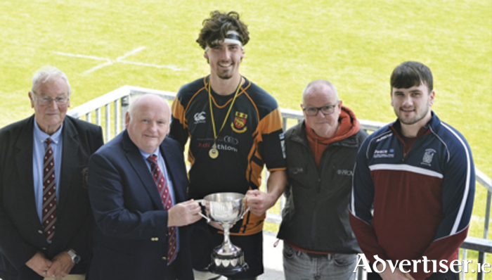 Buccaneer’s U20s claimed the Scallon Cup at the weekend with an impressive victory over Enniskillen.  Team captain Fionn McDonnell is pictured receiving the cup from Enniskillen RFC President, Tommy Bane.  Also pictured are Gordon Thompson, Brendan Wikins and Tomas Scallon