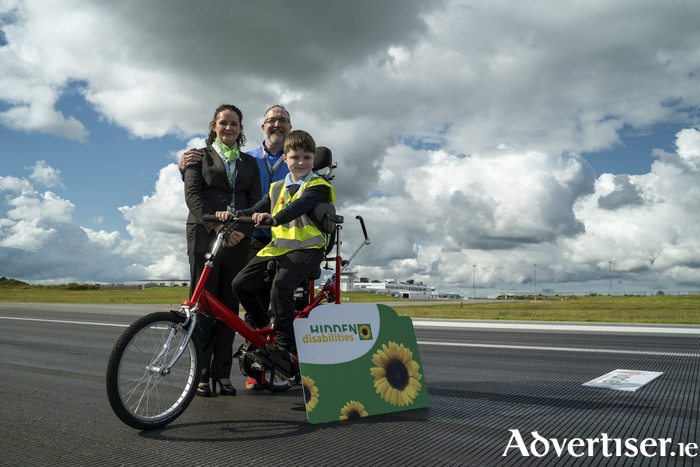 Pictured left to right at the launch of the Hidden Disabilities Sunflower programme at Ireland West Airport were, Tristan Casson-Rennie Regional Director Hidden Disabilities Sunflower Ireland, Sarah Rowley, Head of Customer & Airline Services Ireland West Airport and Kyle Heanue on bicycle from Louisburgh Co. Mayo