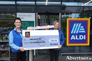 Pictured at the ALDI Tuam Store, Co. Galway is Maureen Grealish of Tuam Cancer Care receiving a &euro;500 donation from Christine Quinn, ALDI Deputy Store Manager, as part of ALDI&rsquo;s Community Grants programme. 