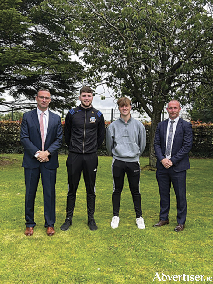 Marist College leaving certificate students, Michael Henry and Conor Gill, are pictured with principal, Michael Dermody and deputy principal, Paul Kelly